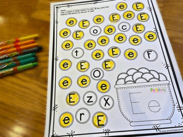 8. Pot of Gold Letter Find St Patricks Day Printable Worksheets - with Preschool Play & Learn“Make working on letter discrimination FUN with these super cute, Pot of Gold St. Patrick’s day worksheets.”