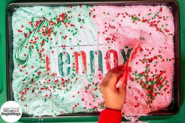 Sensory Salt Prewriting Tray for Preschoolers: *This is an optional step, but I placed a laminated sheet of printer paper with Lennox's name underneath the sand to allow him to uncover or trace his name if desired.